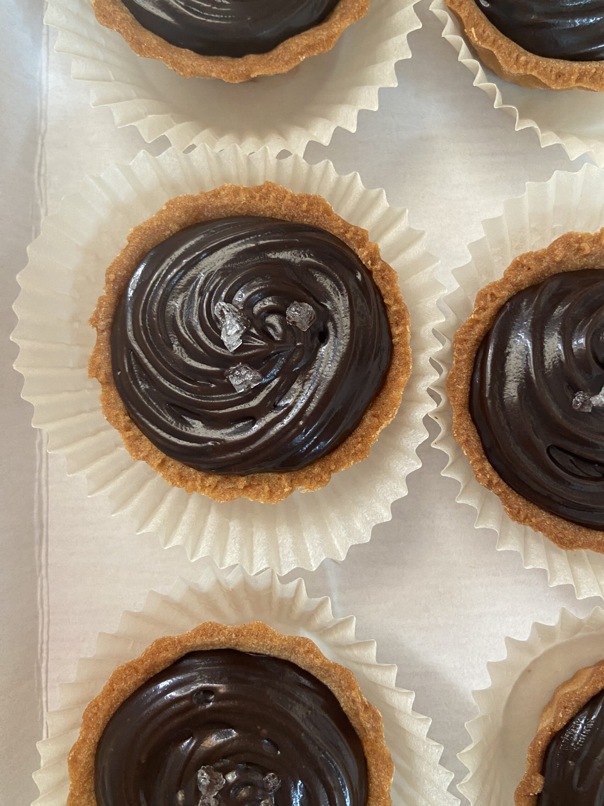 Chocolate tarts sprinkled with sea salt among the best bakery items of Salz Bakes
